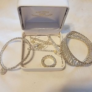 Set of bracelets, earrings, ring and necklace